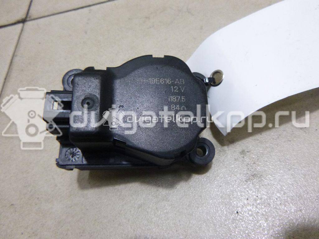 Фото Моторчик заслонки отопителя  3m5h19e616ab для Ford Focus / Tourneo / C-Max / Galaxy / Kuga {forloop.counter}}
