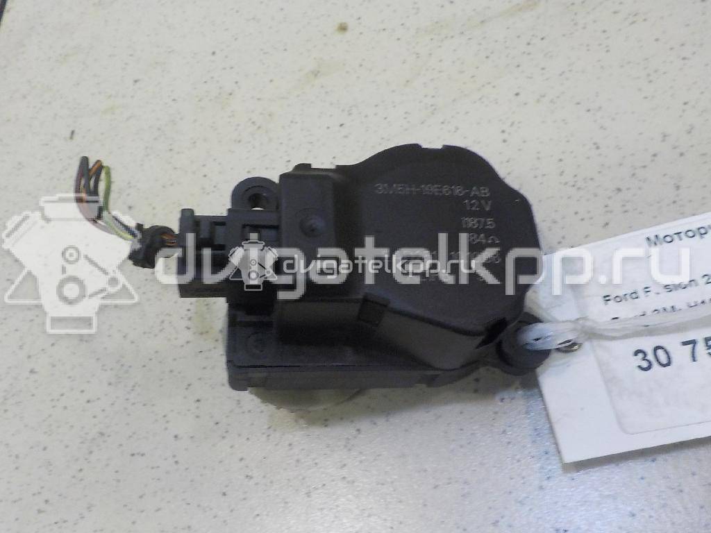 Фото Моторчик заслонки отопителя  3m5h19e616ab для Ford Focus / Tourneo / C-Max / Galaxy / Kuga {forloop.counter}}