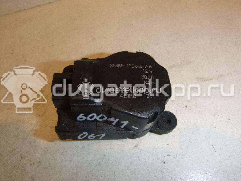 Фото Моторчик заслонки отопителя  3m5h19e616ab для Ford Focus / Tourneo / C-Max / Galaxy / Kuga {forloop.counter}}