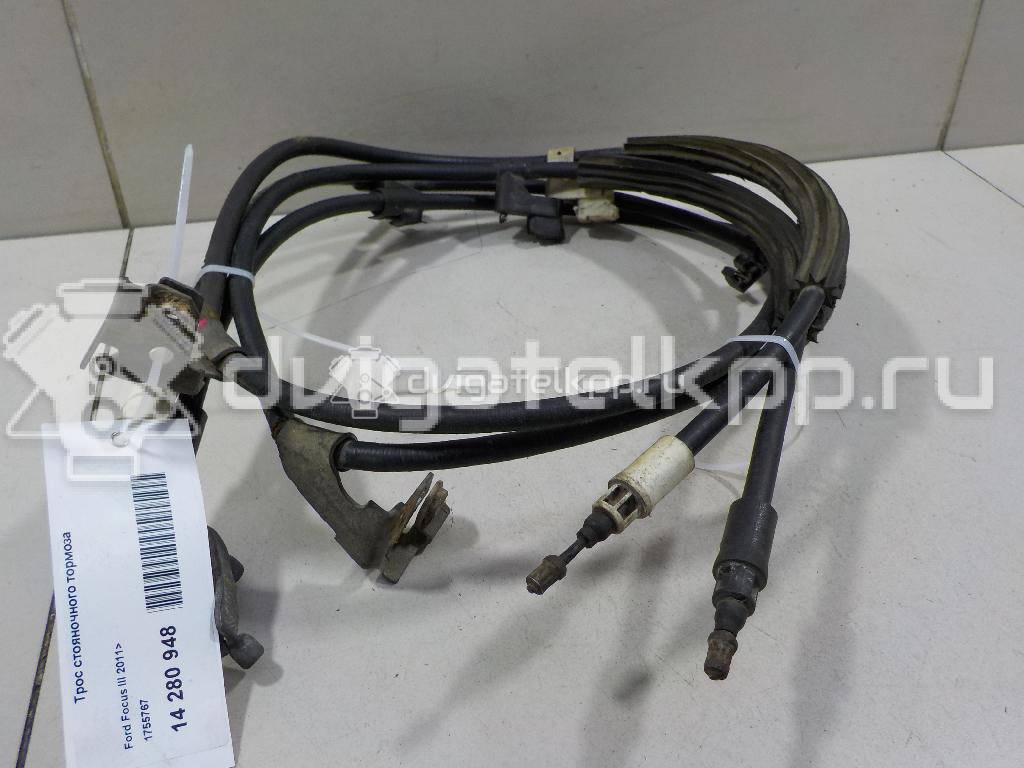 Фото Трос стояночного тормоза  1755767 для Ford Focus / C-Max {forloop.counter}}