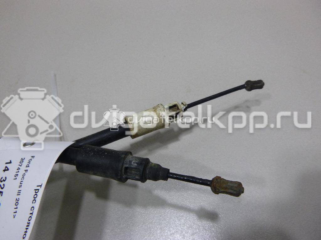 Фото Трос стояночного тормоза  2074151 для Ford Focus / C-Max {forloop.counter}}