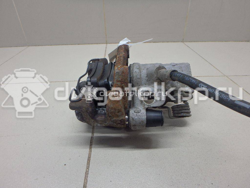 Фото Суппорт тормозной задний левый  8M512M089BC для Ford Focus / Tourneo / C-Max / Grand / Kuga {forloop.counter}}