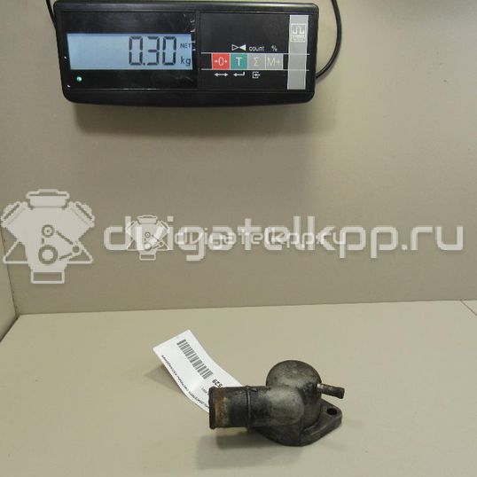 Фото Фланец двигателя системы охлаждения  1027596 для Ford Fiesta / Ka