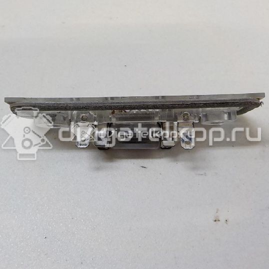 Фото Фонарь подсветки номера  1332916 для Ford Fiesta / Mondeo / Fusion Ju