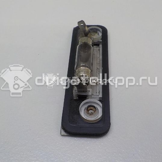 Фото Фонарь подсветки номера  1332916 для Ford Fiesta / Mondeo / Fusion Ju