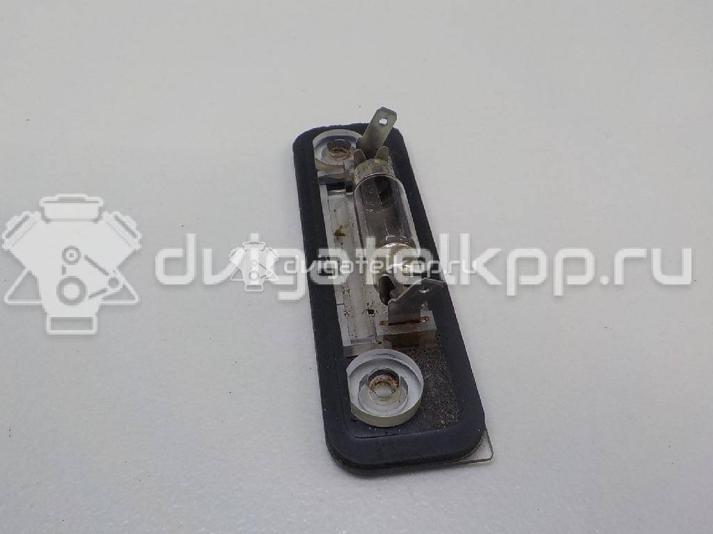 Фото Фонарь подсветки номера  1332916 для Ford Fiesta / Mondeo / Fusion Ju {forloop.counter}}