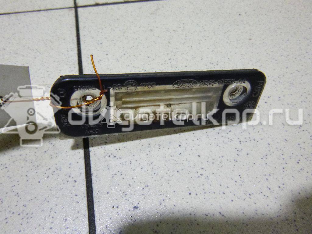Фото Фонарь подсветки номера  1332916 для Ford Fiesta / Mondeo / Fusion Ju {forloop.counter}}