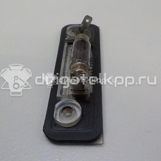 Фото Фонарь подсветки номера  1332916 для Ford Fiesta / Mondeo / Fusion Ju