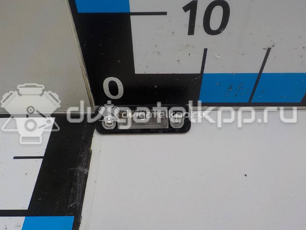 Фото Фонарь подсветки номера  1332916 для Ford Fiesta / Mondeo / Fusion Ju {forloop.counter}}