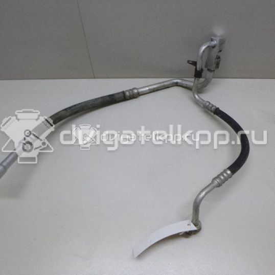Фото Трубка кондиционера  1477376 для Ford Fiesta / Fusion Ju