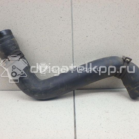 Фото Патрубок радиатора  1546445 для Ford Fiesta / Fusion Ju