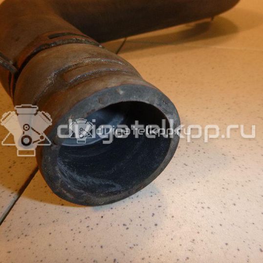 Фото Патрубок радиатора  1546445 для Ford Fiesta / Fusion Ju