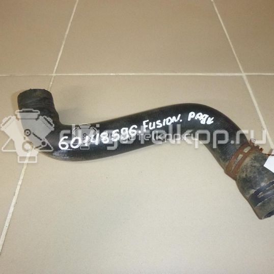 Фото Патрубок радиатора  1546445 для Ford Fiesta / Fusion Ju