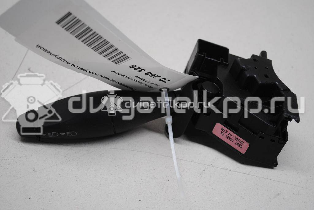 Фото Переключатель поворотов подрулевой  1379849 для Ford Fiesta {forloop.counter}}