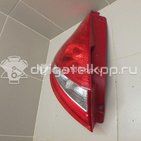Фото Фонарь задний левый  8A6113405AC для Ford Fiesta