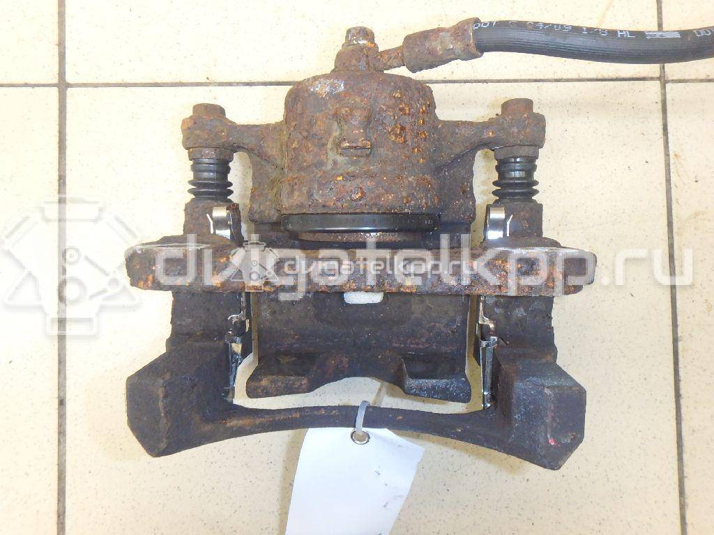Фото Суппорт тормозной передний правый  8V512B294AB для Ford Fiesta {forloop.counter}}