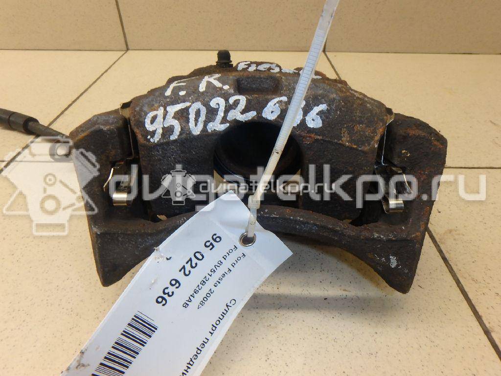 Фото Суппорт тормозной передний правый  8V512B294AB для Ford Fiesta {forloop.counter}}
