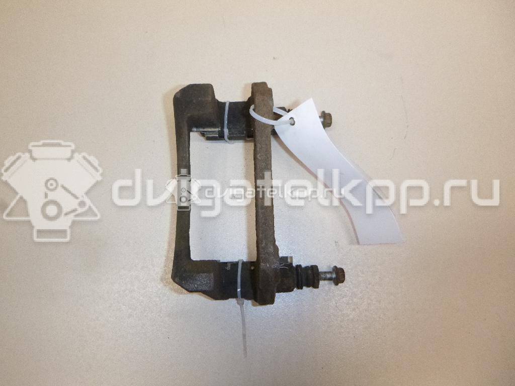 Фото Скоба суппорта переднего правого  1719272 для Ford Fiesta {forloop.counter}}