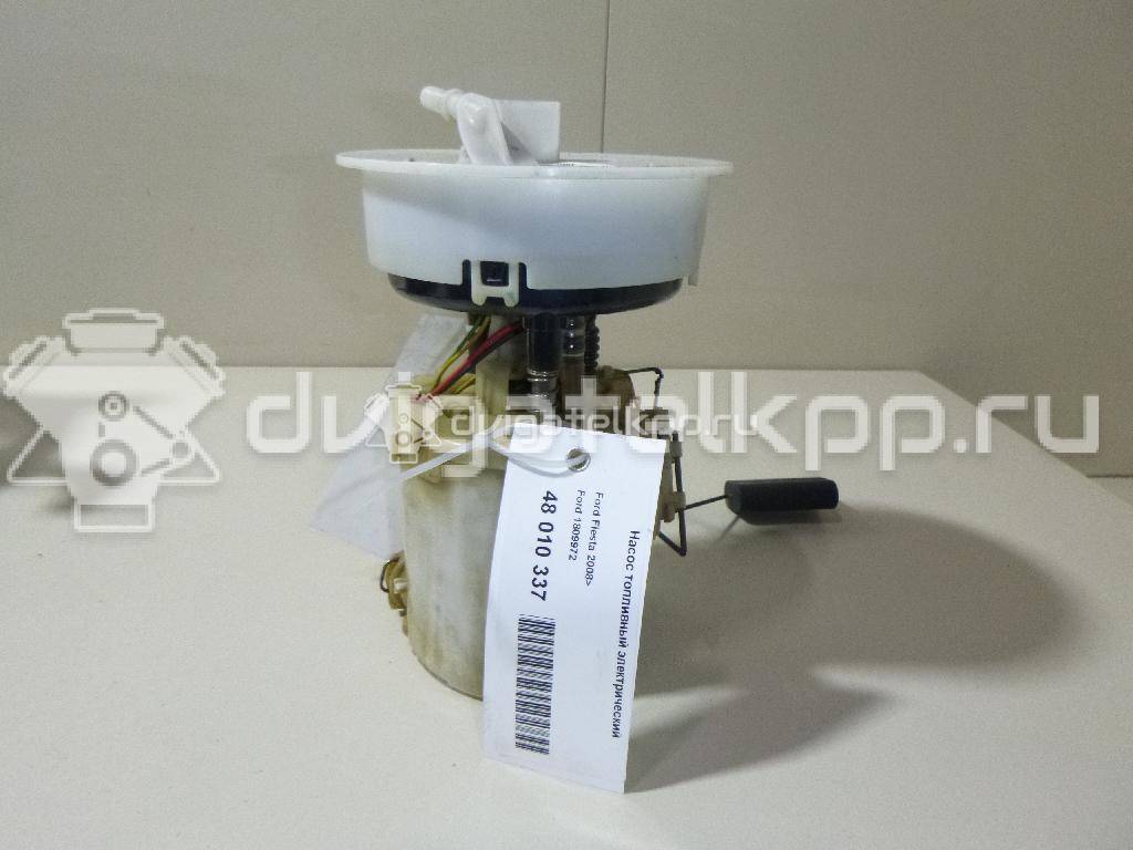 Фото Насос топливный электрический  1809972 для Ford Fiesta {forloop.counter}}