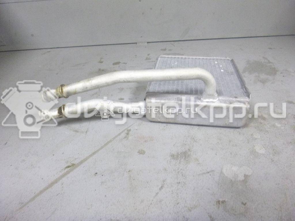 Фото Радиатор отопителя  XS4H18476AB для Ford Focus / Tourneo / Transit {forloop.counter}}