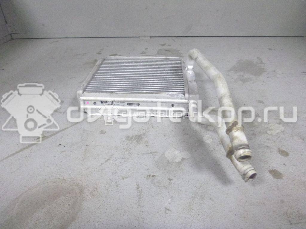 Фото Радиатор отопителя  XS4H18476AB для Ford Focus / Tourneo / Transit {forloop.counter}}