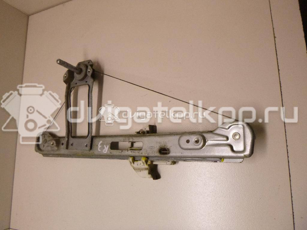 Фото Стеклоподъемник механ. задний правый  1331607 для Ford Focus {forloop.counter}}