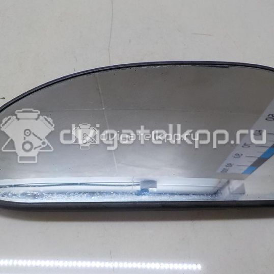 Фото Стекло зеркала механического левого  1060610 для Ford Fiesta / Focus
