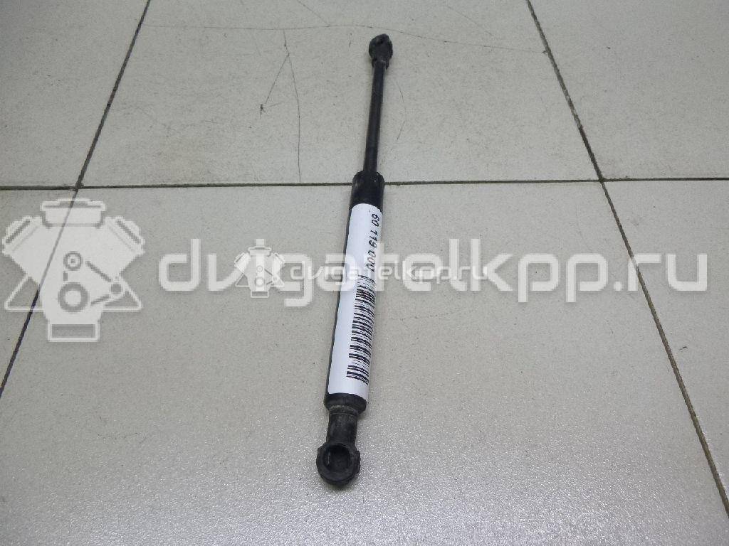 Фото Амортизатор крышки багажника  XS41F406A10AF для Ford Focus {forloop.counter}}