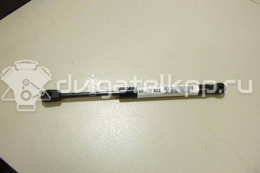 Фото Амортизатор крышки багажника  5M51F406A10AB для Ford Focus / Sierra {forloop.counter}}