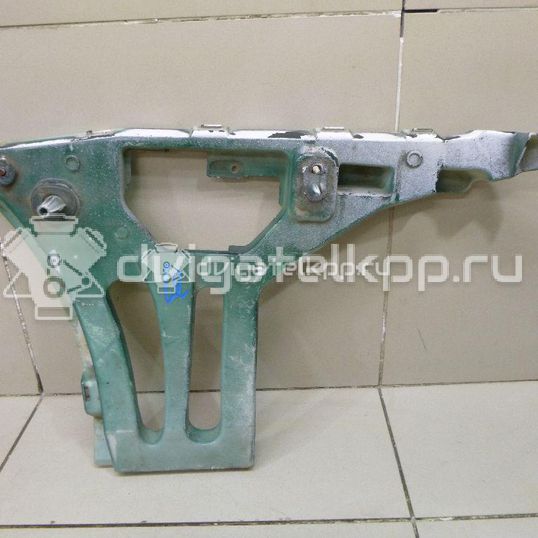 Фото Кронштейн заднего бампера правый  1215618 для Ford Focus