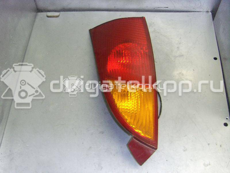 Фото Фонарь задний левый  1214223 для Ford Focus {forloop.counter}}