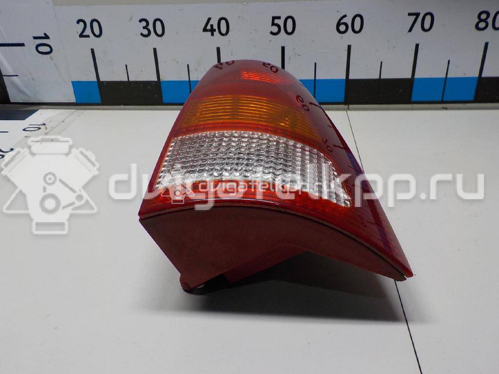 Фото Фонарь задний правый  1M5113A602EB для Ford Focus {forloop.counter}}