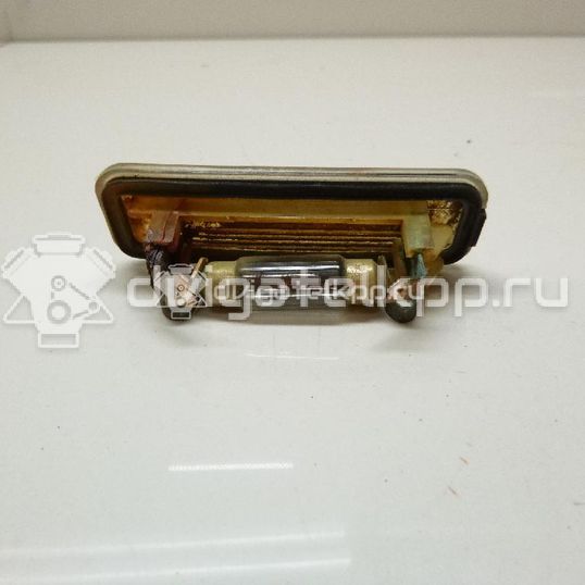 Фото Фонарь подсветки номера  1109489 для Ford Focus