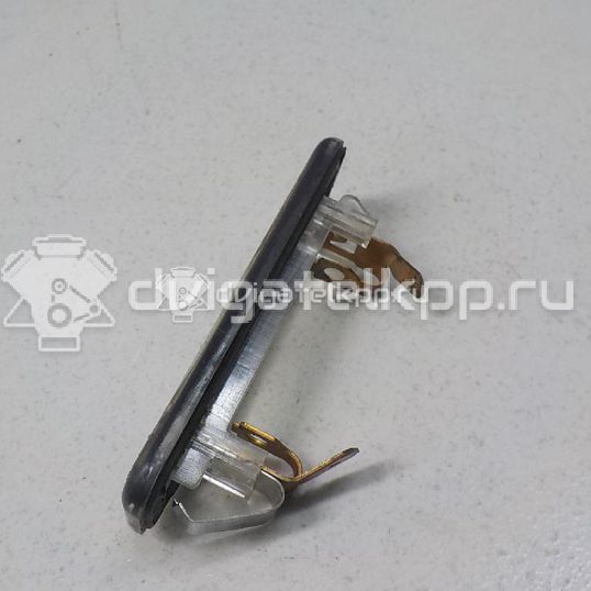 Фото Фонарь подсветки номера  1109489 для Ford Focus