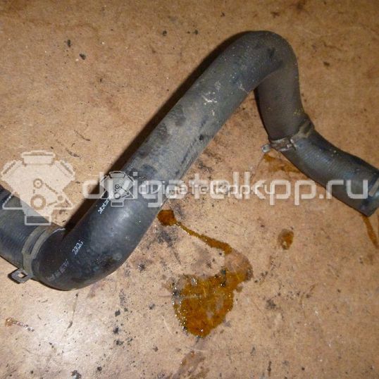 Фото Патрубок радиатора  98AB8B273AF для Ford Focus