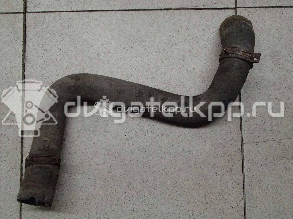 Фото Патрубок радиатора  1134580 для Ford Focus {forloop.counter}}