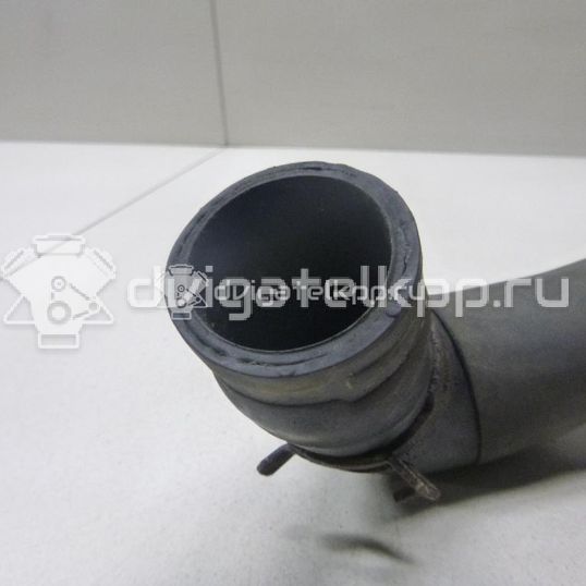 Фото Патрубок радиатора  1134581 для Ford Focus