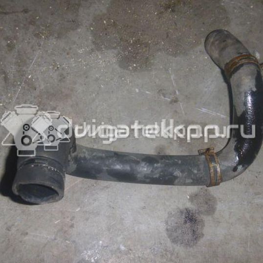 Фото Патрубок радиатора  98AB8B273AH для Ford Focus