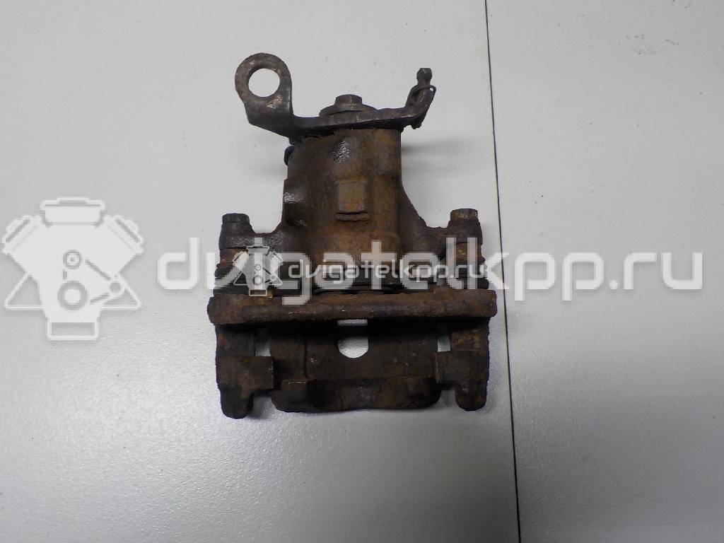 Фото Суппорт тормозной задний правый  R98AX2552AA для Ford Focus {forloop.counter}}