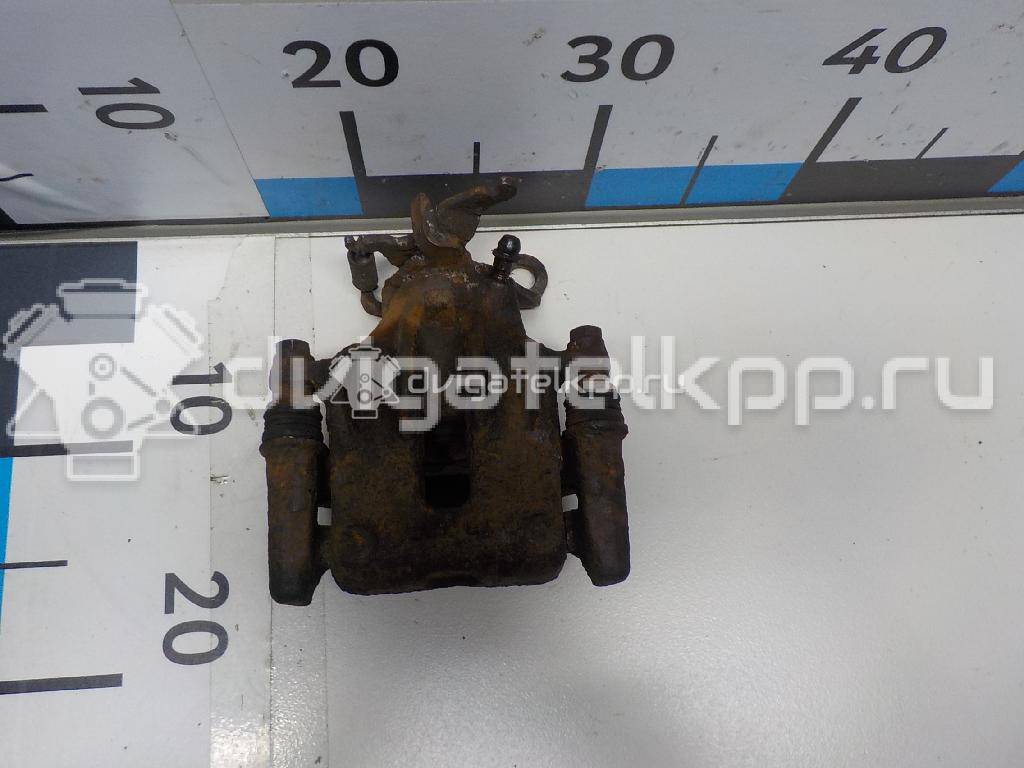 Фото Суппорт тормозной задний правый  R98AX2552AA для Ford Focus {forloop.counter}}