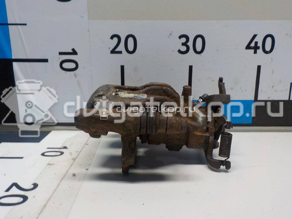 Фото Суппорт тормозной задний левый  R98AX2553AA для Ford Focus {forloop.counter}}