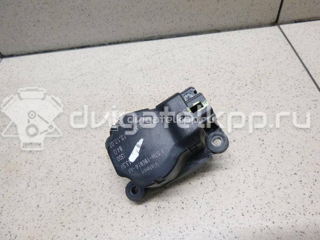 Фото Моторчик заслонки отопителя  1S7H19E616AA для Ford Focus / Mondeo {forloop.counter}}