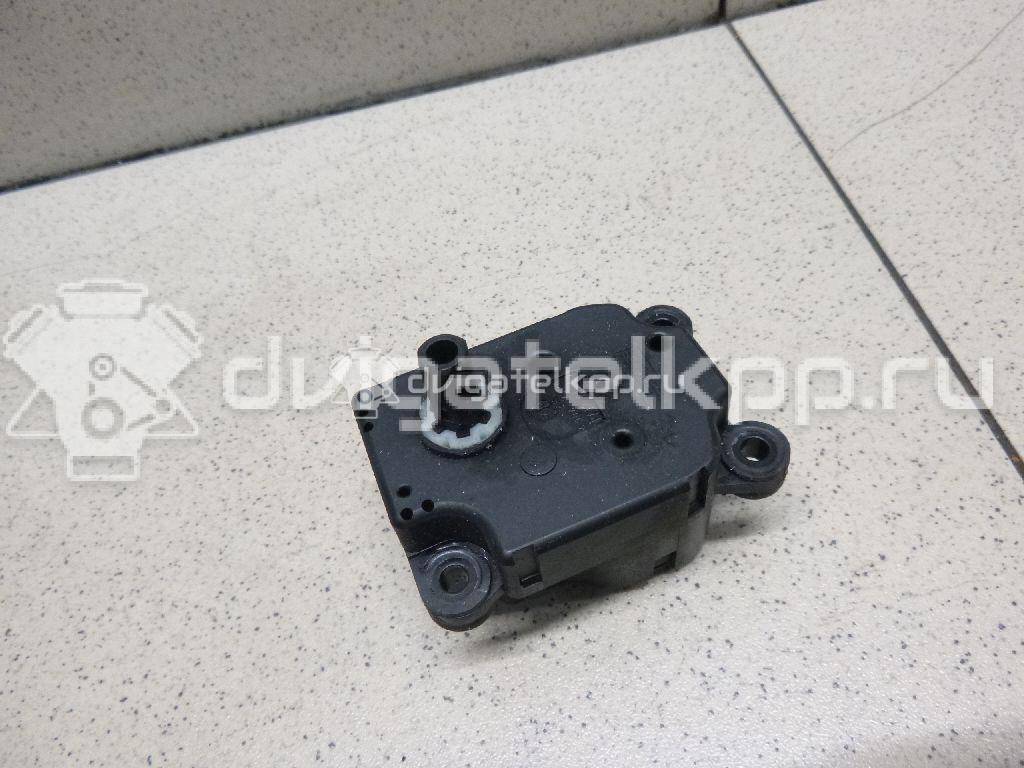 Фото Моторчик заслонки отопителя  1S7H19E616AA для Ford Focus / Mondeo {forloop.counter}}