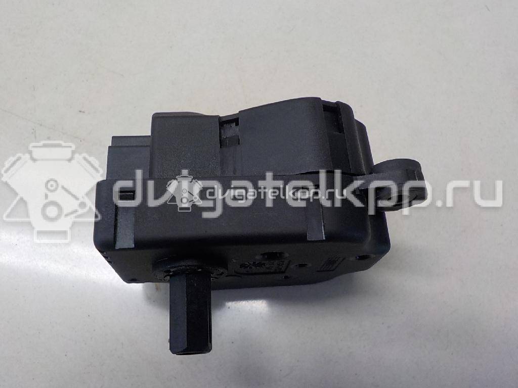 Фото Моторчик заслонки отопителя  1S7H19E616AA для Ford Focus / Mondeo {forloop.counter}}
