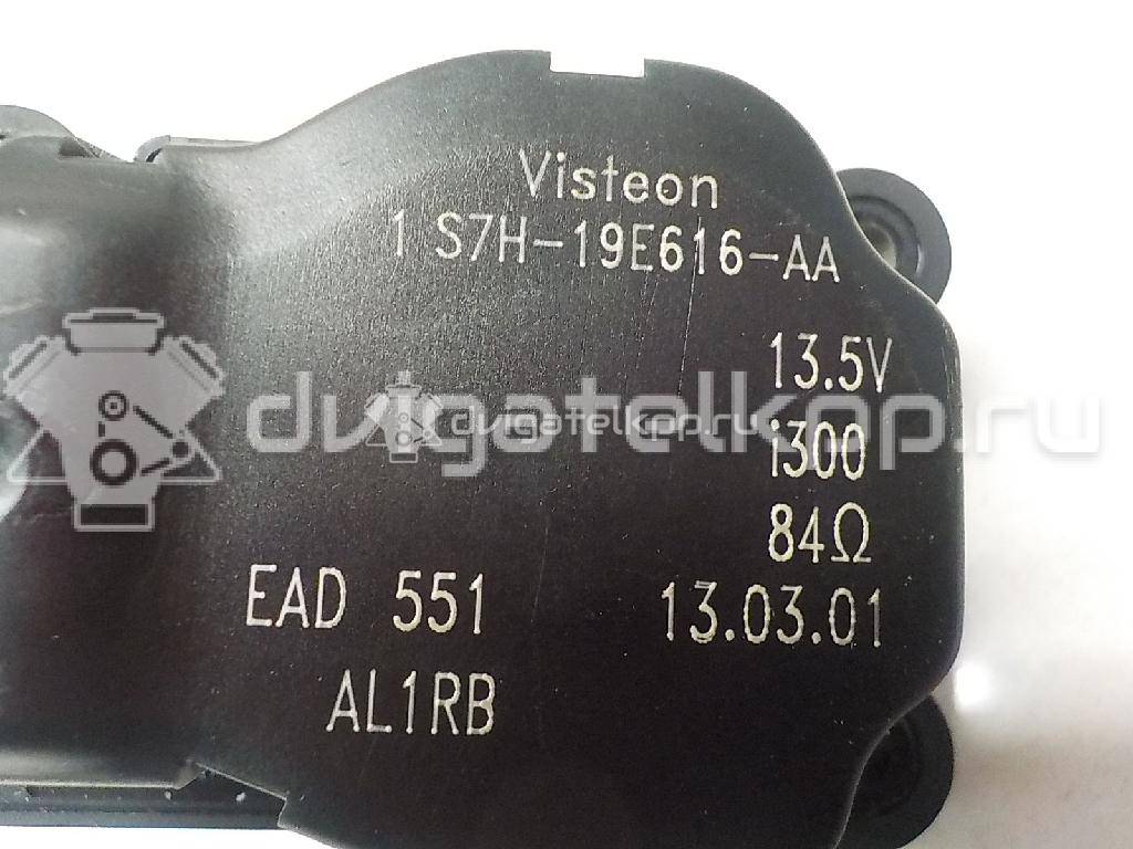 Фото Моторчик заслонки отопителя  1S7H19E616AA для Ford Focus / Mondeo {forloop.counter}}