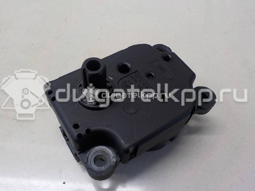 Фото Моторчик заслонки отопителя  1S7H19E616AA для Ford Focus / Mondeo {forloop.counter}}
