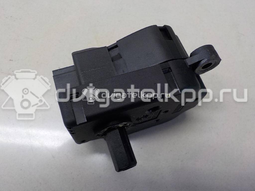 Фото Моторчик заслонки отопителя  1S7H19E616AA для Ford Focus / Mondeo {forloop.counter}}