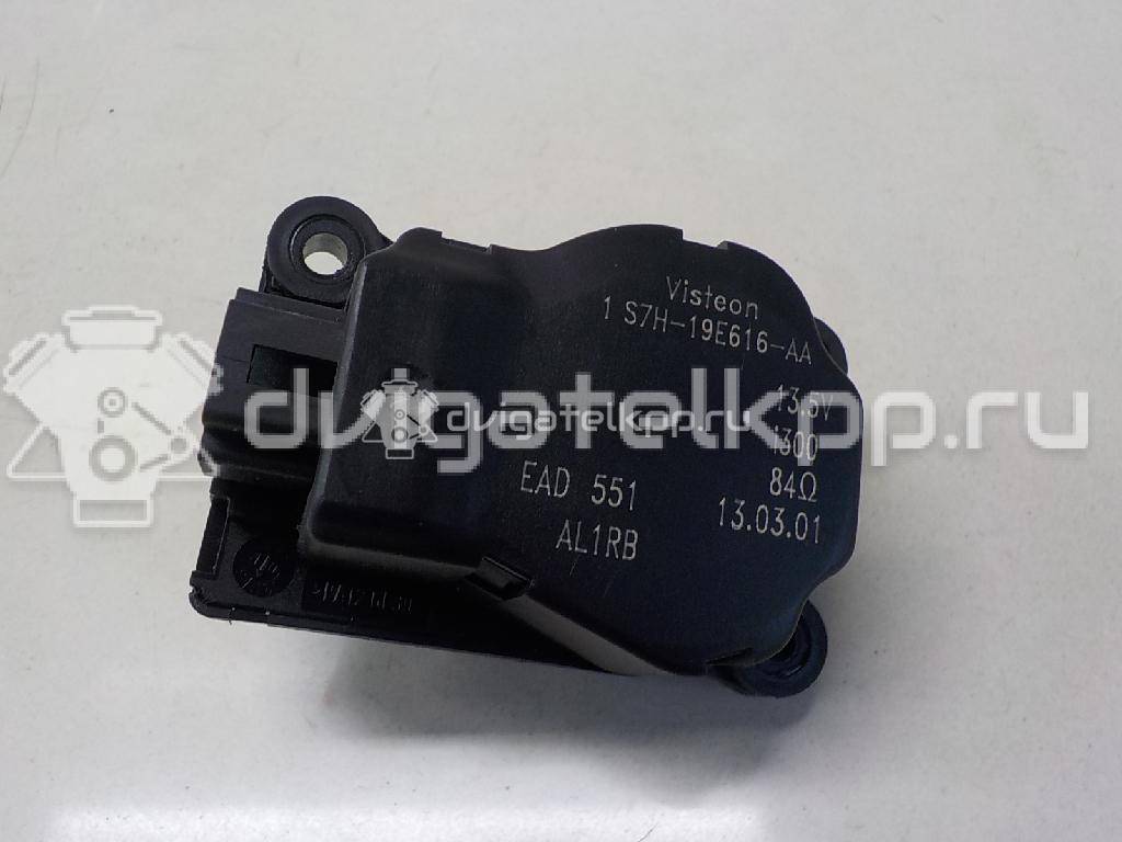 Фото Моторчик заслонки отопителя  1S7H19E616AA для Ford Focus / Mondeo {forloop.counter}}