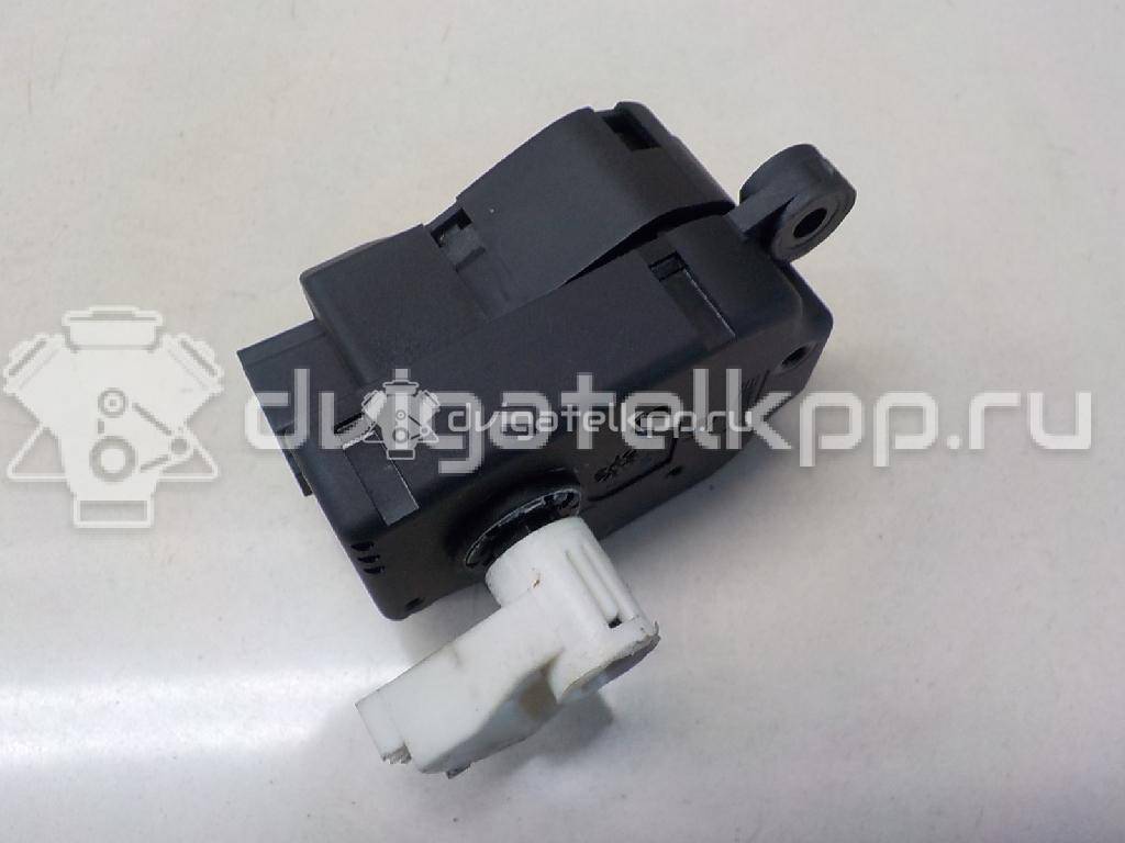 Фото Моторчик заслонки отопителя  1S7H19E616AA для Ford Focus / Mondeo {forloop.counter}}