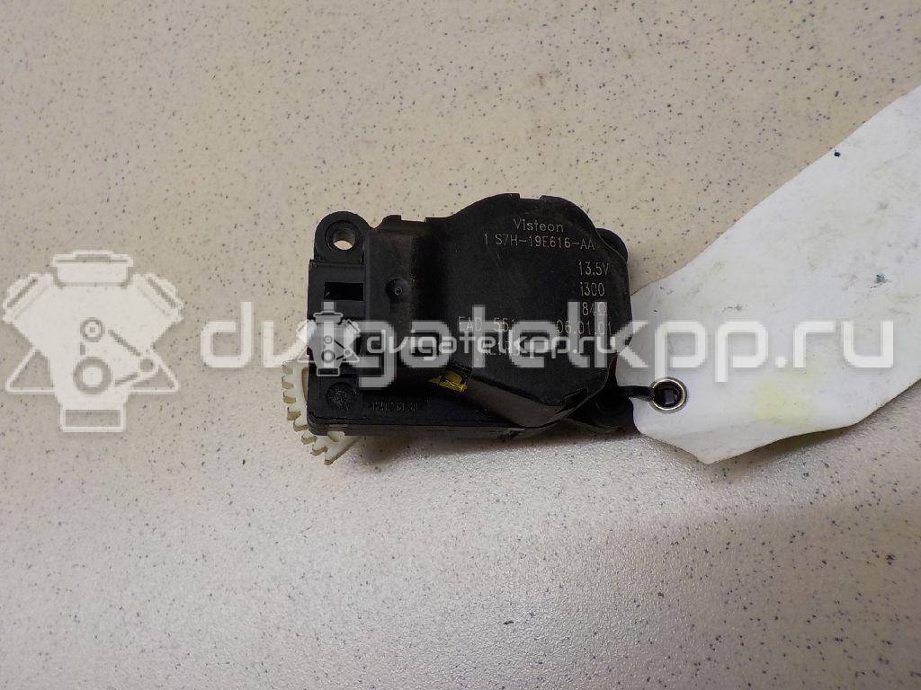 Фото Моторчик заслонки отопителя  1S7H19E616AA для Ford Focus / Mondeo {forloop.counter}}